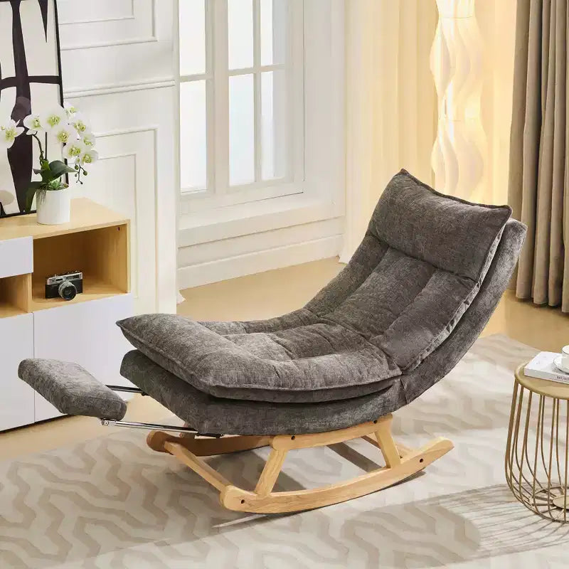 Fauteuil à bascule rembourré en bois massif avec repose-pieds escamotable