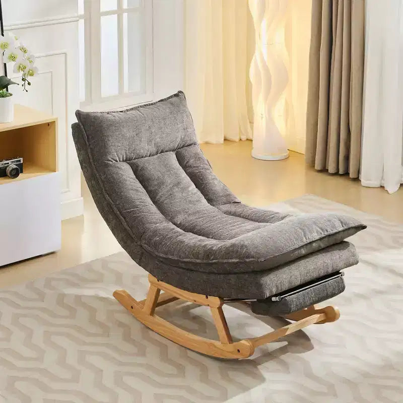 Fauteuil à bascule rembourré en bois massif avec repose-pieds escamotable