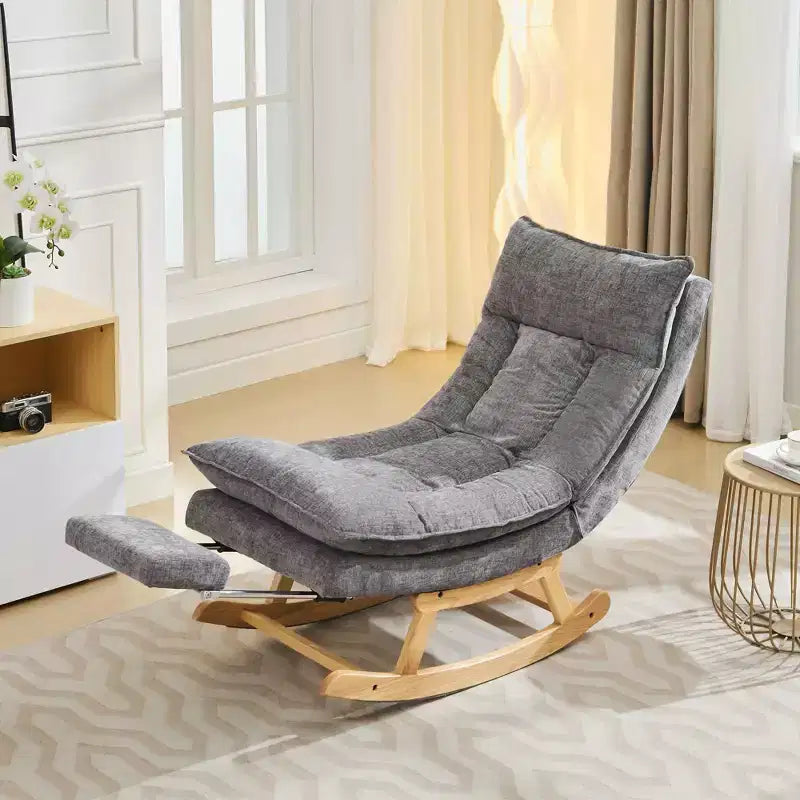 Fauteuil à bascule rembourré en bois massif avec repose-pieds escamotable