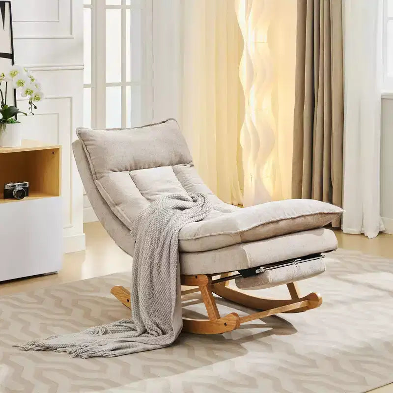 Fauteuil à bascule rembourré en bois massif avec repose-pieds escamotable
