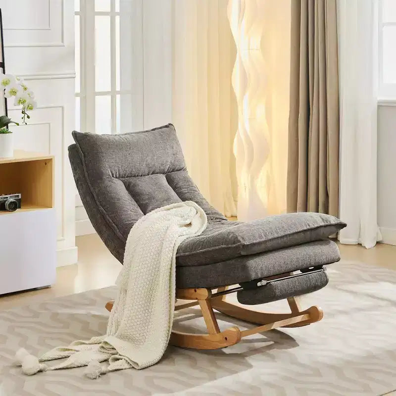 Fauteuil à bascule rembourré en bois massif avec repose-pieds escamotable