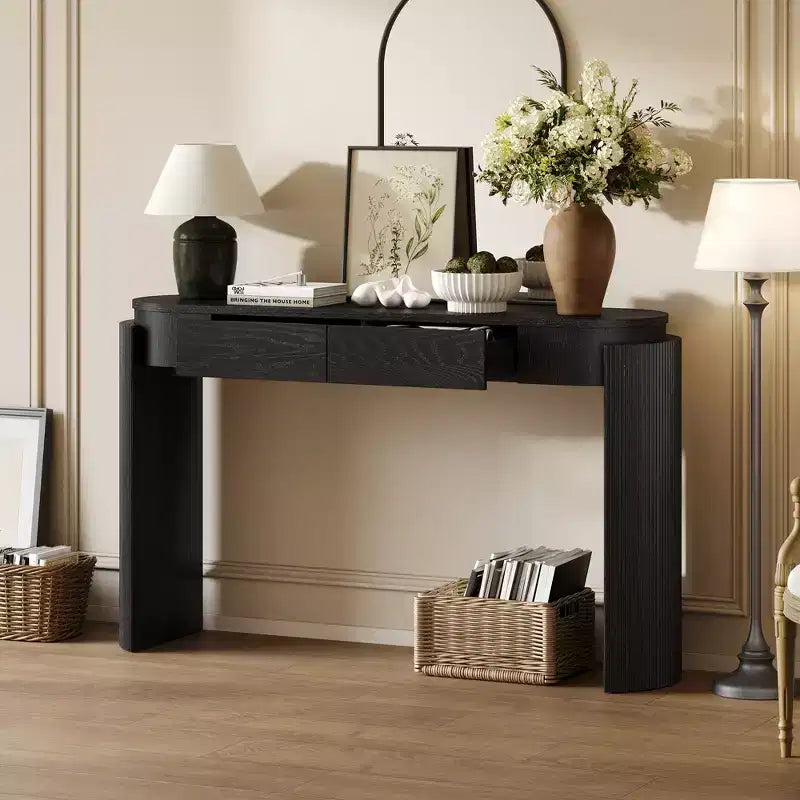 Console avec finition en grain de bois naturel, design cannelé, plateau ovale et 2 tiroirs pour entrée et salon, noire